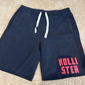 Hollister Men's Navy Shorts with Red Logo